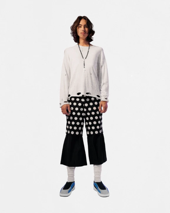 Loptel model in playful streetwear style with sneakers