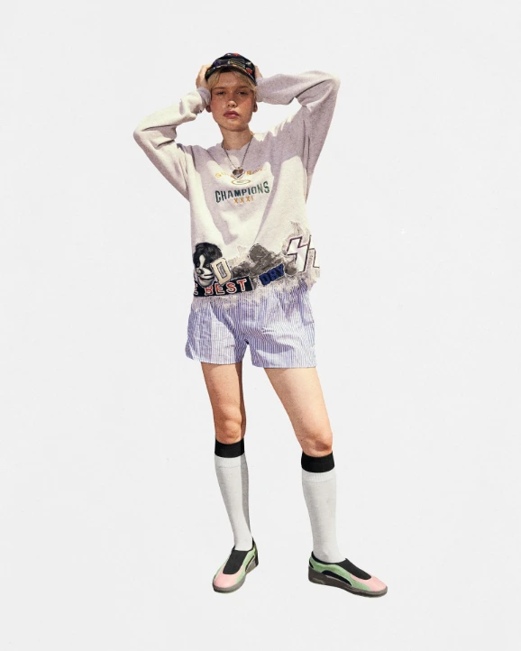 Loptel model wearing casual denim outfit and sneakers
